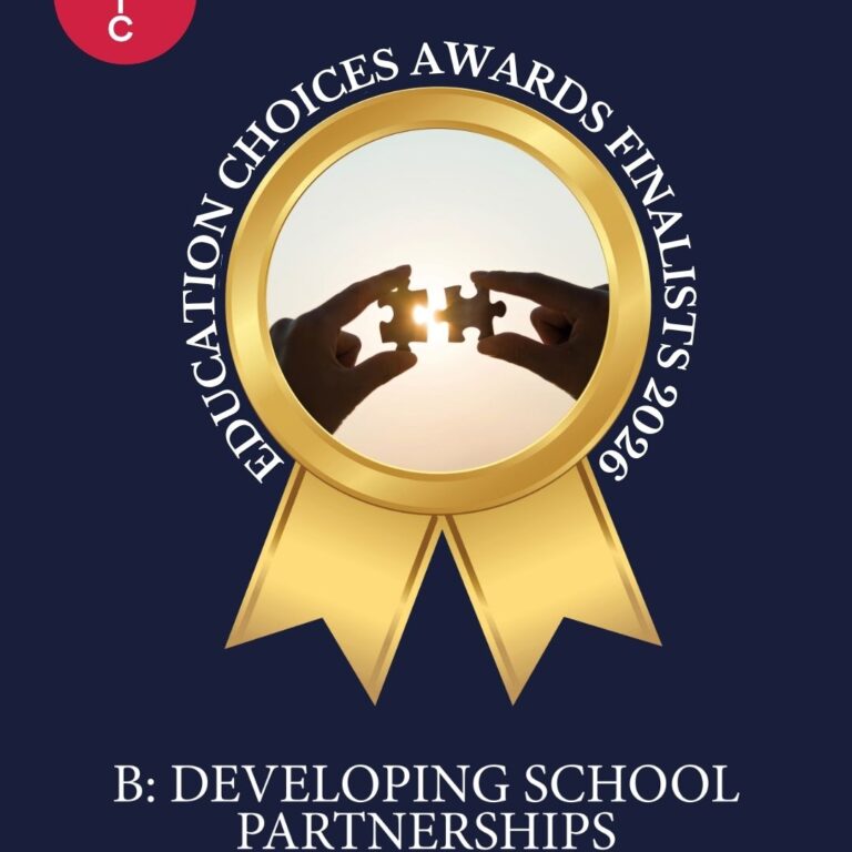 Gold award badge on a navy background, two hands fitting puzzle pieces together inside a circular frame with a gold ribbon beneath. Perhaps part of an awards series.